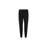 Madison Flux Women's DWR Trail Trousers, lightweight and stretch water-repellent MTB pants with a long fit, shown on a model.