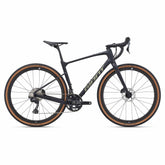 Giant Revolt Advanced 0 2024 gravel bike with Shimano GRX 820 groupset and disc brakes, ready for off-road adventures.