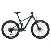 Giant Stance 29 2 full suspension mountain bike with Shimano CUES U6000 components, showing the bike's frame and front suspension.