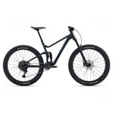 Giant Stance 29 2 full suspension mountain bike with Shimano CUES U6000 components, showing the bike's frame and front suspension.