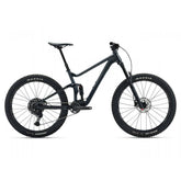 Giant Stance mountain bike with 125mm rear FlexPoint suspension and 140mm front fork, ready for trail riding.