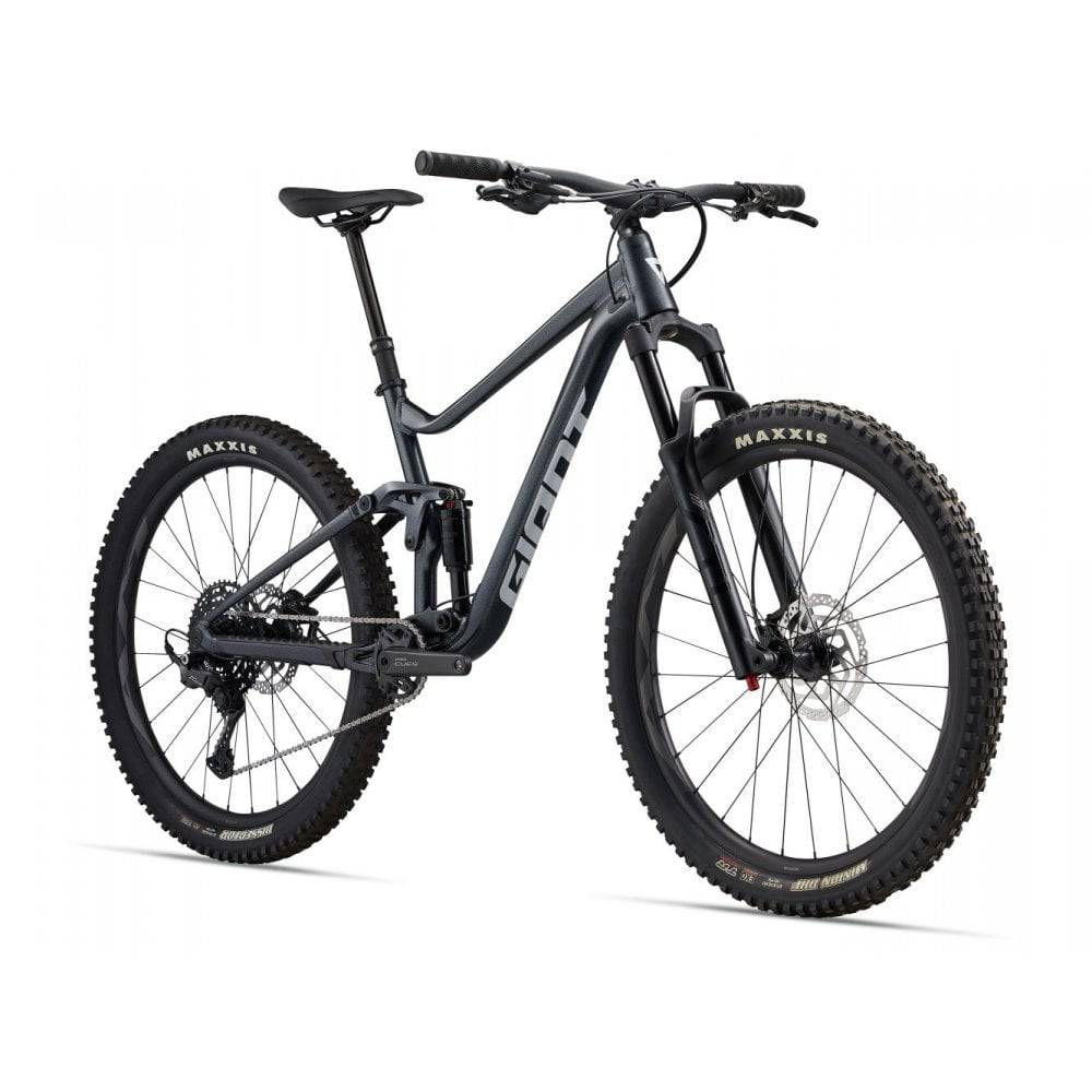 Giant Stance mountain bike with 125mm rear FlexPoint suspension and 140mm fork, ready for trail riding on rugged terrain.