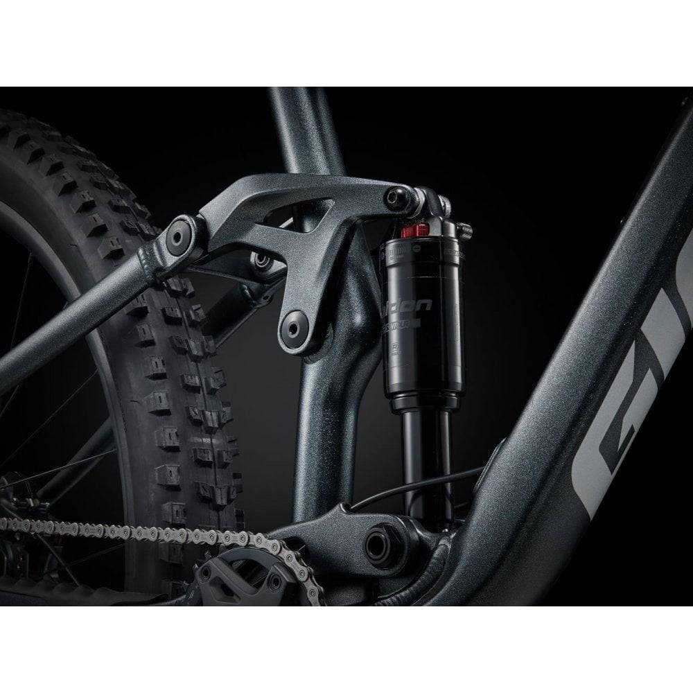 Giant Stance mountain bike with 125mm rear suspension, 140mm fork, and rugged frame for trail riding and off-road adventures.