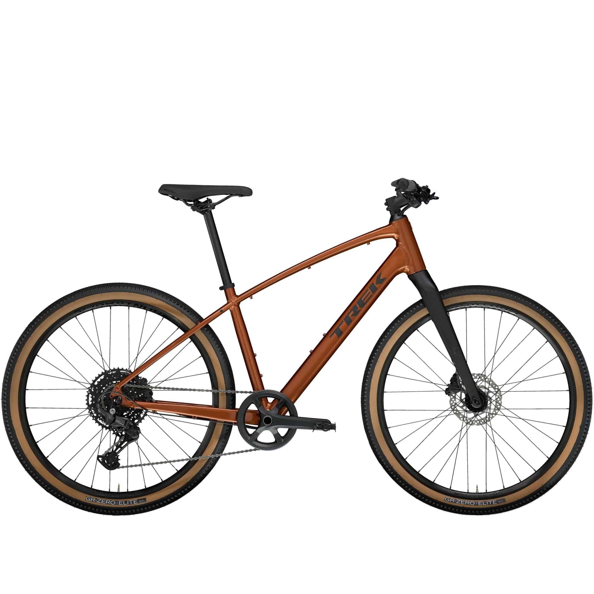 Trek Dual Sport 3 Gen 5 hybrid bike with Shimano CUES 1x10 drivetrain and hydraulic disc brakes, shown outdoors with mountain scenery