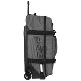 OGIO Travel Rig 9800 wheeled gear bag with foam padding and oversized wheels for durable travel and gear transport.