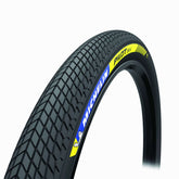 Michelin Pilot SX tubeless-ready BMX tyre 20x1.70 with high grip and durability, shown mounted on a bicycle wheel.