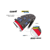 Michelin DH34 downhill bike park tyre with Gum-X technology, tubeless ready, mounted on a mountain bike wheel.