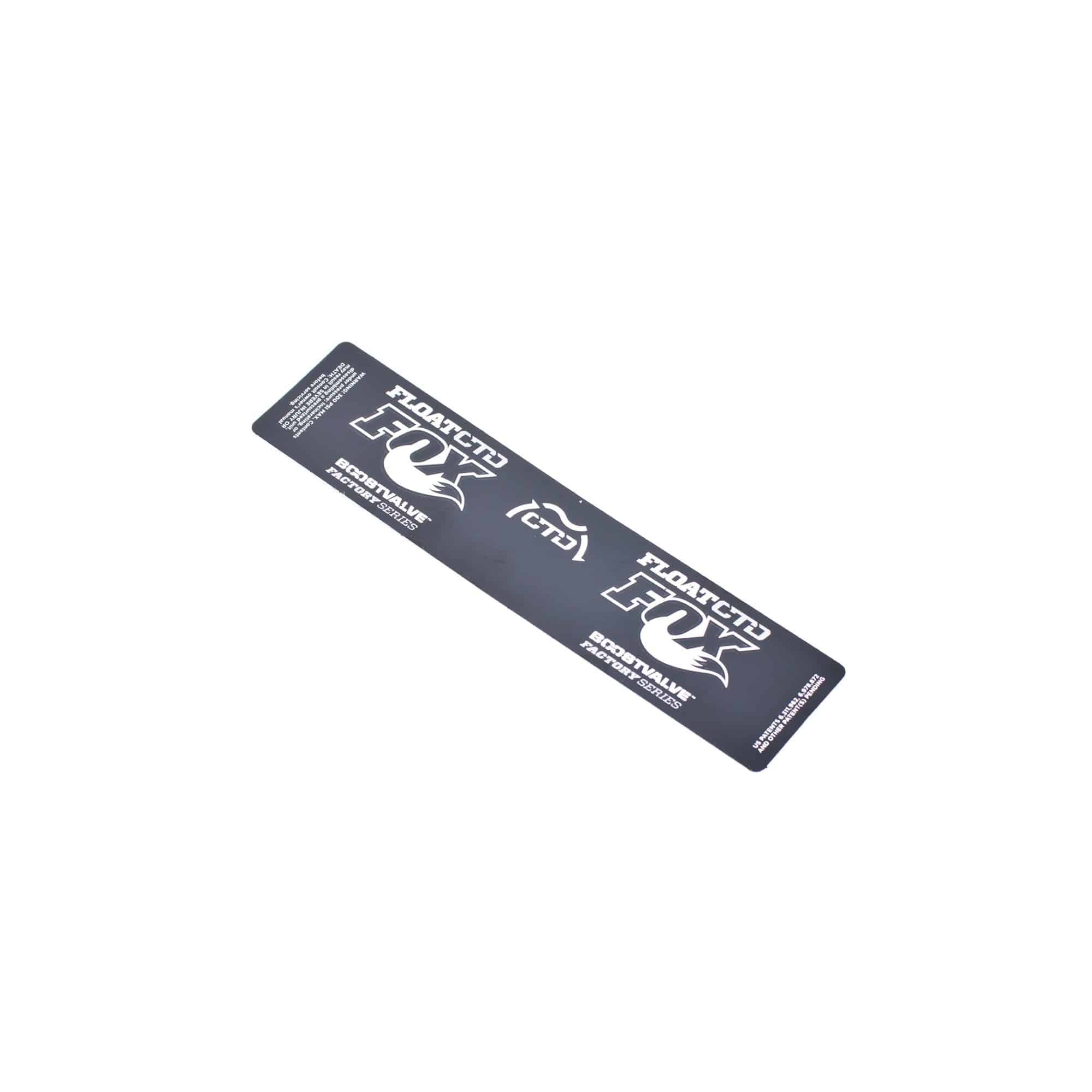 Black and silver Fox Float CTD remote decal for 2013 shock components, shown on a suspension spare part.