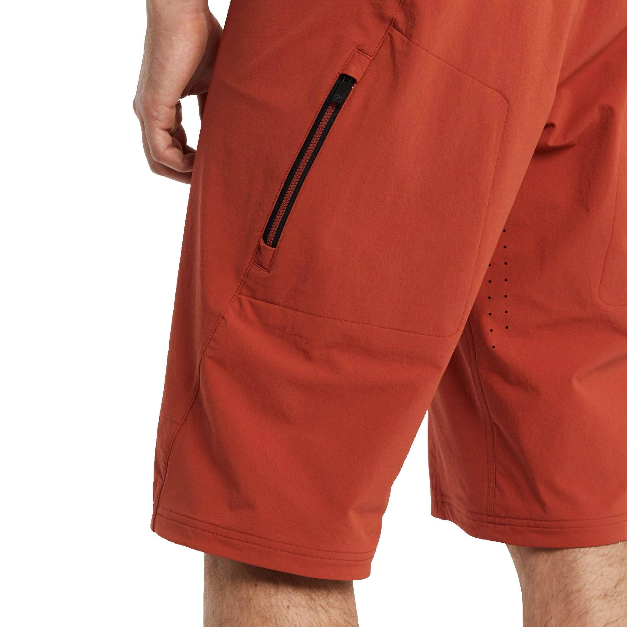 Fox Hightail Enduro Shorts with venting, adjustable waistband, and zipper pockets for mountain biking and outdoor activities.