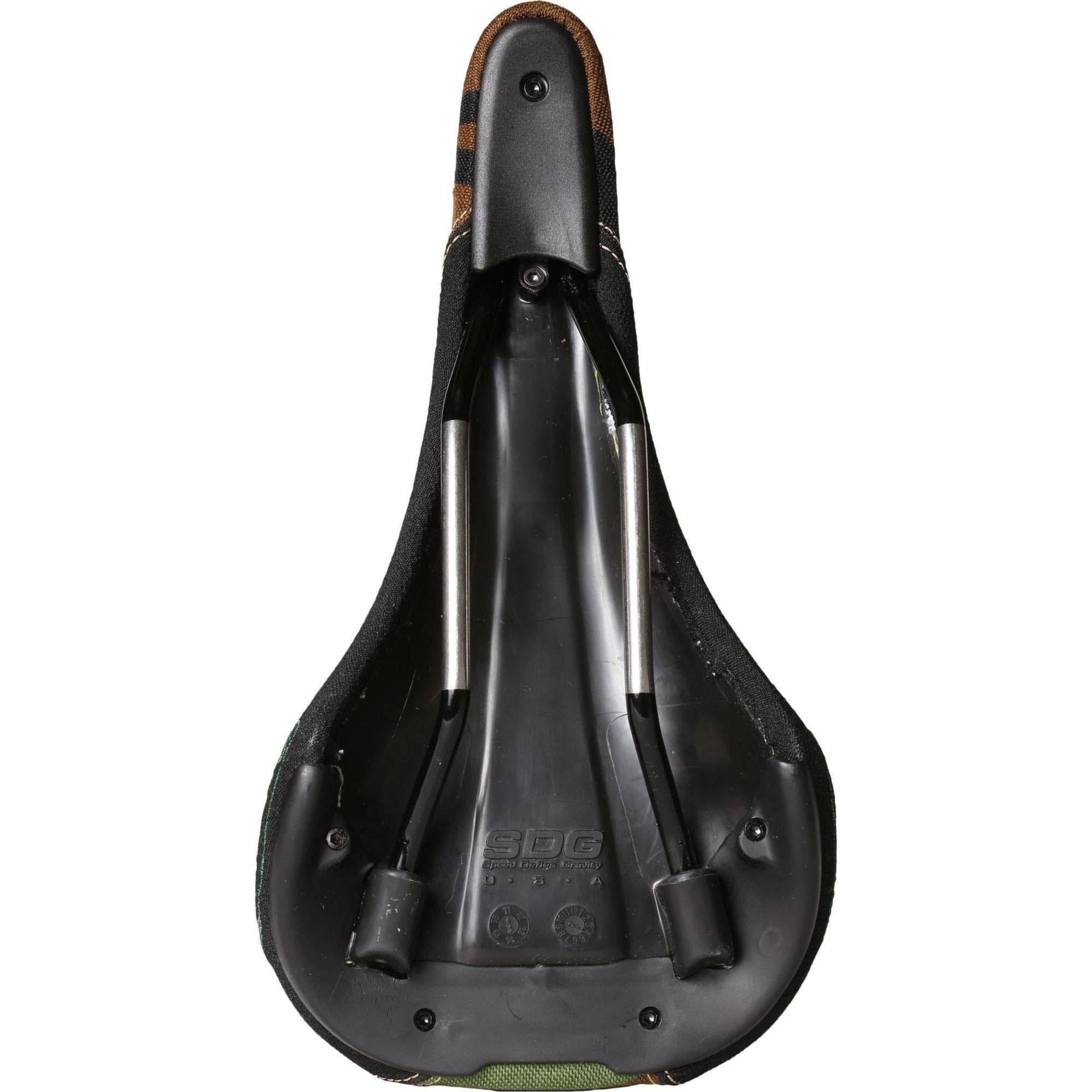 SDG Bel Air titanium alloy rail bike saddle for MTB, cyclocross, and road riding showing the saddle with titanium rails and ergonomic design.