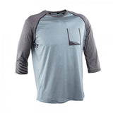 Race Face Race Face Stage ¾ MTB jersey with breathable venting and goggle wipe, unisex cycling clothing for mountain biking.