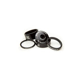 Race Face aluminium headset spacer kit with top cap for bike components, featuring multiple spacers and a sturdy top cap for bike assembly.
