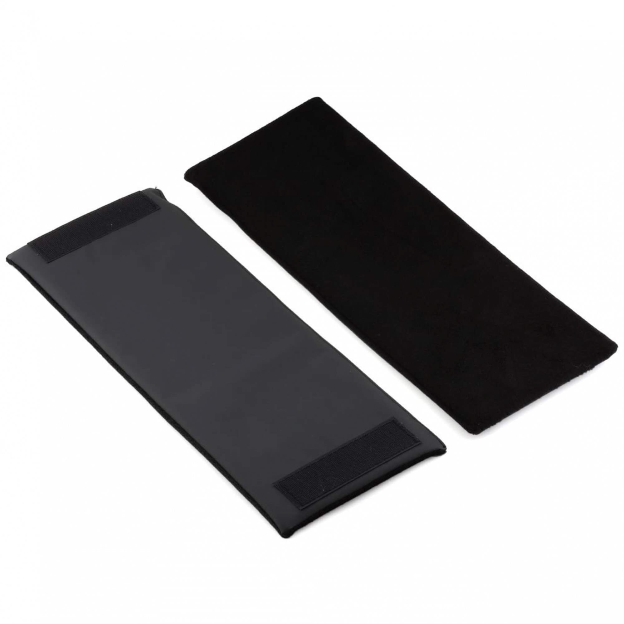 Race Face T2 Tailgate Pad, a two-piece backup camera door protector accessory for vehicle travel, shown on a vehicle.