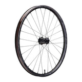 Race Face Next R 36mm carbon MTB wheels with tubeless ready tires and boost axle, designed for mountain biking performance.