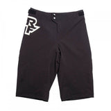 Race Face Sendy Youth mountain bike shorts with adjustable waist and zippered pockets, designed for active cycling wear.