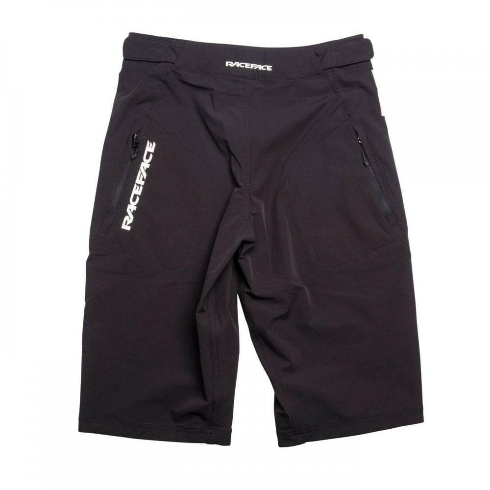Race Face Sendy Youth Mountain Bike Shorts with adjustable waist and zippered pockets, designed for kids' outdoor cycling comfort.