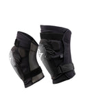 Race Face Roam Knee Guard 2021 with D30 impact protection for mountain biking, showing padded knee armor on a rider.