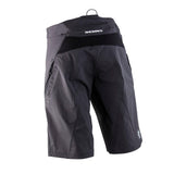 Race Face Ruxton unisex MTB shorts with adjustable ratchet closure and multiple pockets, designed for mountain biking comfort.