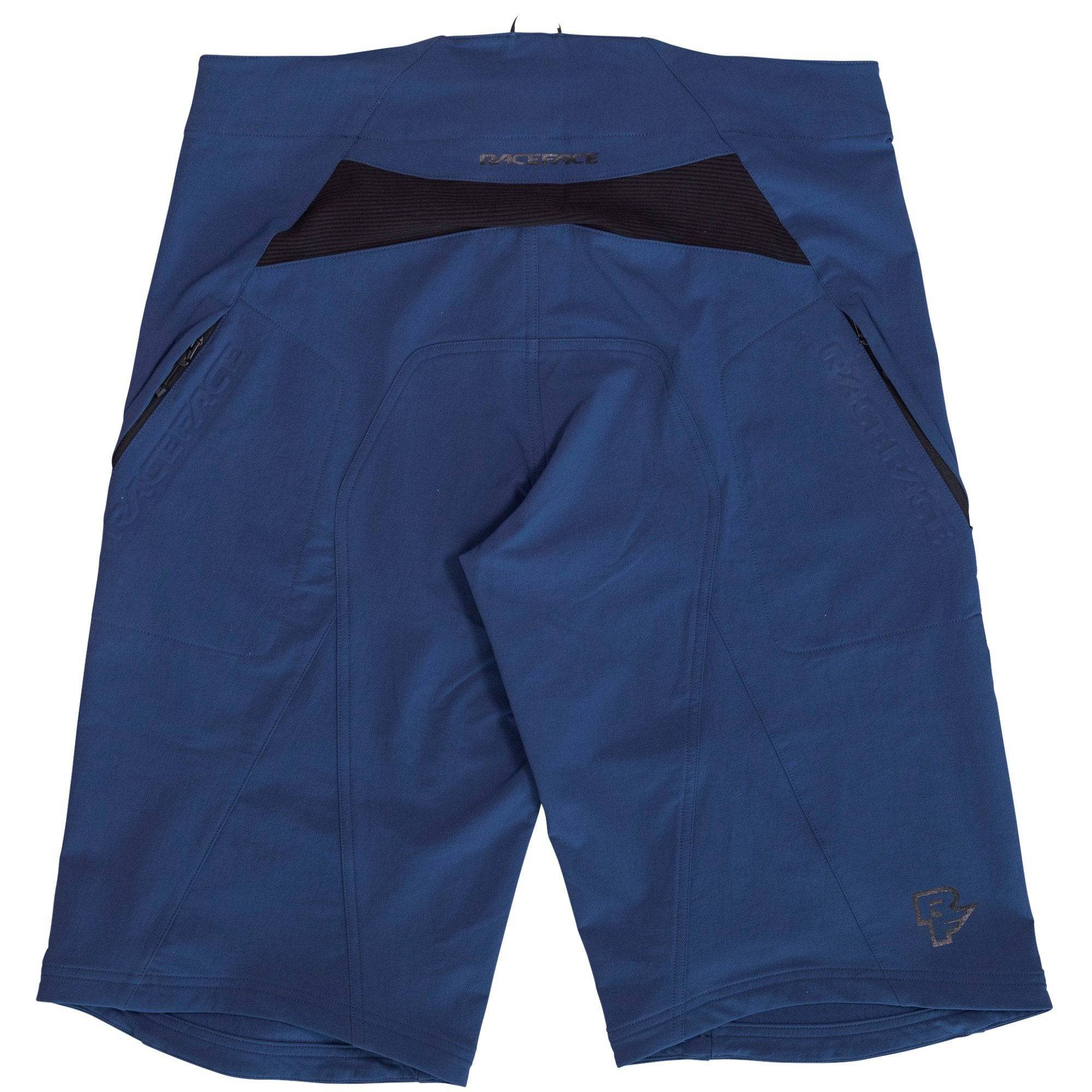 Race Face Ruxton unisex MTB shorts with adjustable ratchet closure and multiple pockets, designed for mountain biking comfort.