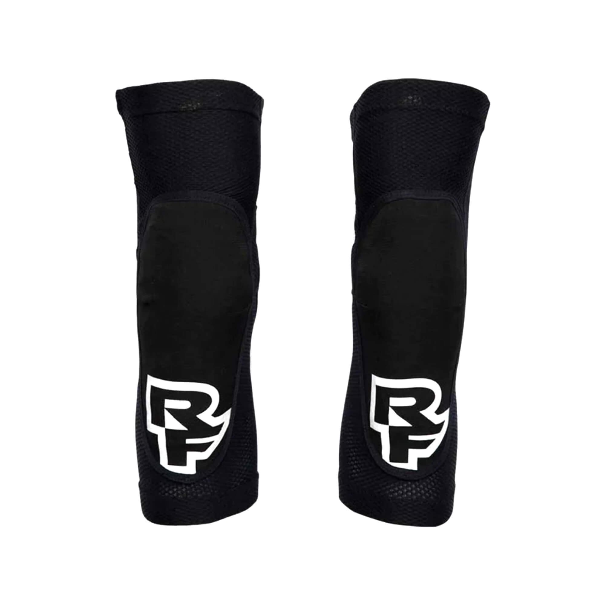 Race Face Covert knee guard with CE D3O protection and breathable design, shown on a model for riding safety and comfort.