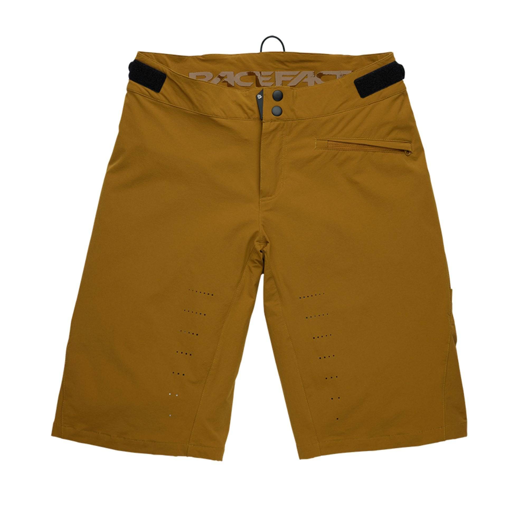 Race Face Indy women's mountain bike shorts with adjustable waist and zippered pockets, designed for cycling comfort and functionality.