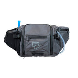 Race Face Stash 3L hydration hip bag with water-resistant pockets and tool bench for cycling accessories and quick access.