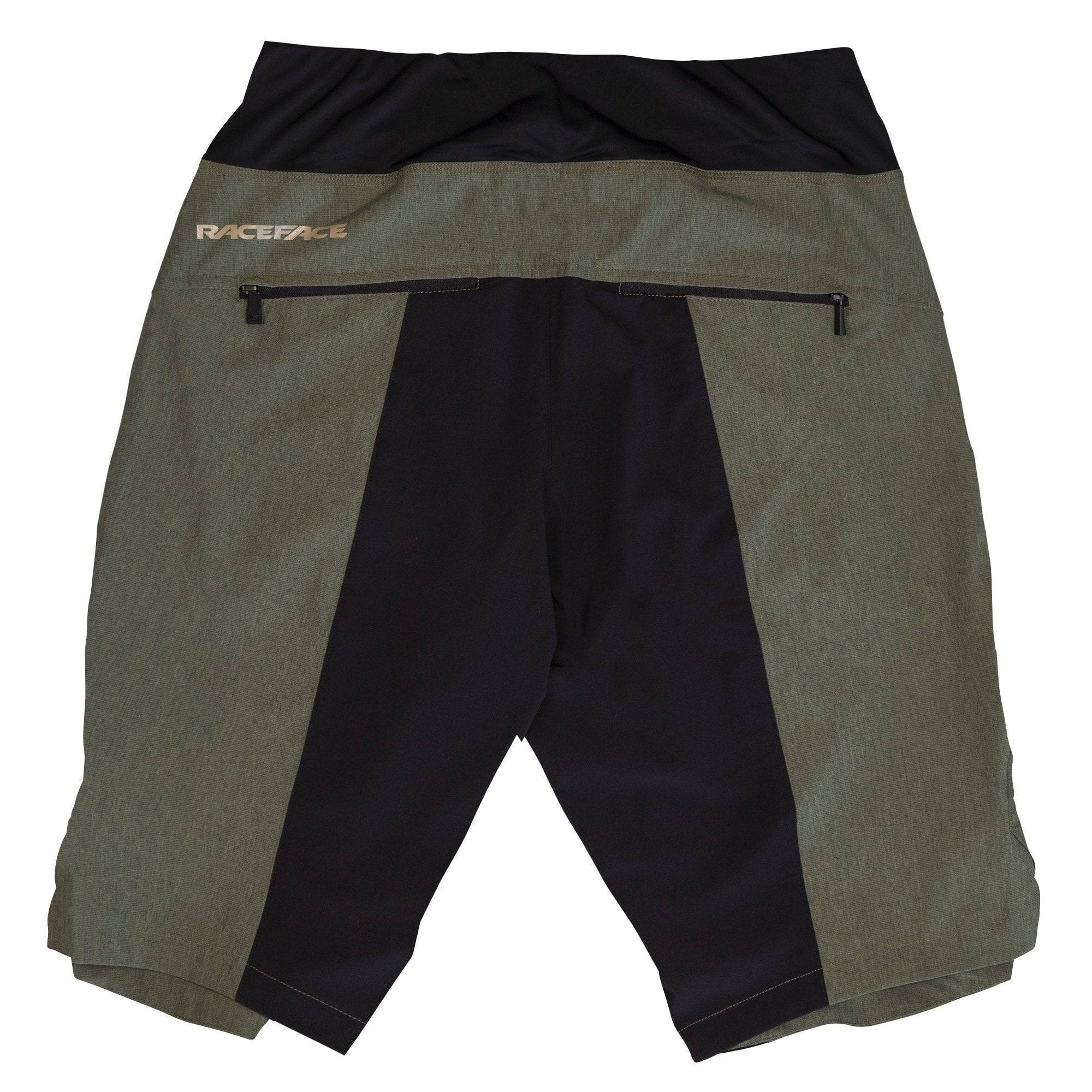 Race Face Traverse women's mountain biking shorts with zippered pockets and ventilation for outdoor cycling comfort.