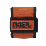 Race Face Luggage Stash Bike Tool Wrap, compact tri-fold organizer for bike tools and accessories in black and gray.