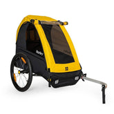 Burley Bee bike trailer for single child with safety harness and weather cover, outdoor accessory for secure cycling.