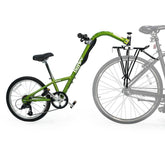 Burley Piccolo kids' bicycle trailer with adjustable seat and 7-speed gears, designed for children aged 4-10, outdoor cycling accessory