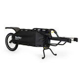 Burley Coho XC cargo bike trailer with suspension system and quick release lever, designed for versatile cycling accessories.
