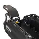 Burley Coho XC cargo bike trailer with suspension and quick release lever, designed for versatile cycling accessories.