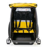 Burley rental Cub child bike trailer with weather protection, designed for high-frequency use, suitable for family biking adventures.