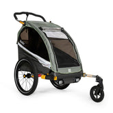 Burley D'Lite X single bike trailer and stroller with adjustable suspension, featuring a sturdy frame and safety harness.