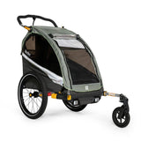 Burley D'Lite X single bike trailer and stroller with adjustable suspension, featuring a sturdy frame and safety harness.