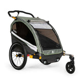 Burley D'Lite X double bike trailer and stroller with adjustable suspension, featuring a sturdy frame and comfortable seating.