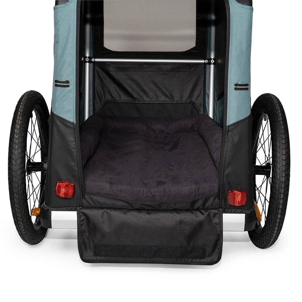 Burley pet bed for Tail Wagon and Bark Ranger trailers, featuring removable foam inserts for comfortable dog resting space.