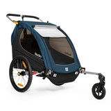 Burley Encore X bike trailer and stroller with suspension, 2-in-1 convertible design for child transportation and outdoor adventures.