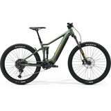 Merida eOne-Forty 400 SE MY24 e-mountain bike with Shimano motor in green and orange, showing the frame and mountain bike tires.