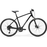 Merida Crossway 300 MY24 hybrid bike with Shimano disc brakes and 700c wheels, black frame, ready for city or trail riding.