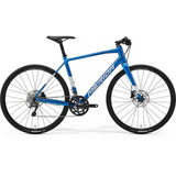 Merida Speeder 300 MY24 hybrid bike in silk blue and dark silver with hydraulic disc brakes, ready for riding.