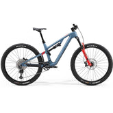 Blue Merida One-Forty 6000 mountain bike with 29-inch wheels and suspension, ready for trail riding.