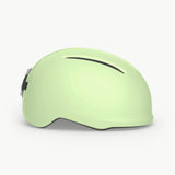 MET Vibe Mips helmet with integrated USB LED light for urban e-bike safety, featuring a sleek design and adjustable straps.