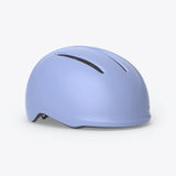 MET Vibe Mips helmet with integrated USB LED light for urban e-bike safety, showcasing the helmet’s sleek design and safety features.