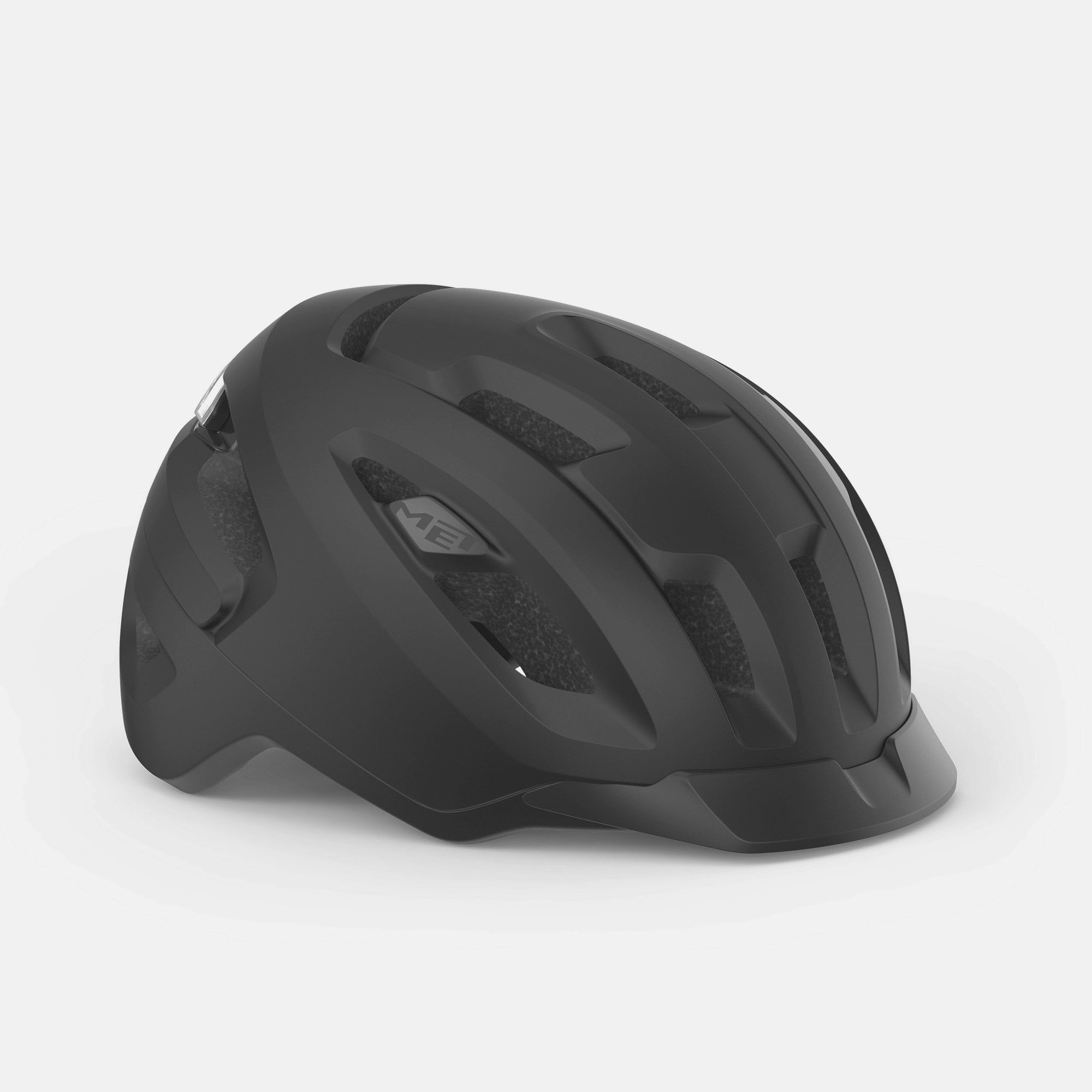 MET Urbex MIPS helmet with NTA 8776 certification and magnetic USB LED light, designed for cycling safety and visibility.