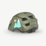Child wearing a MET Hooray toddler helmet with adjustable fit, ventilation, and safety features for active play.