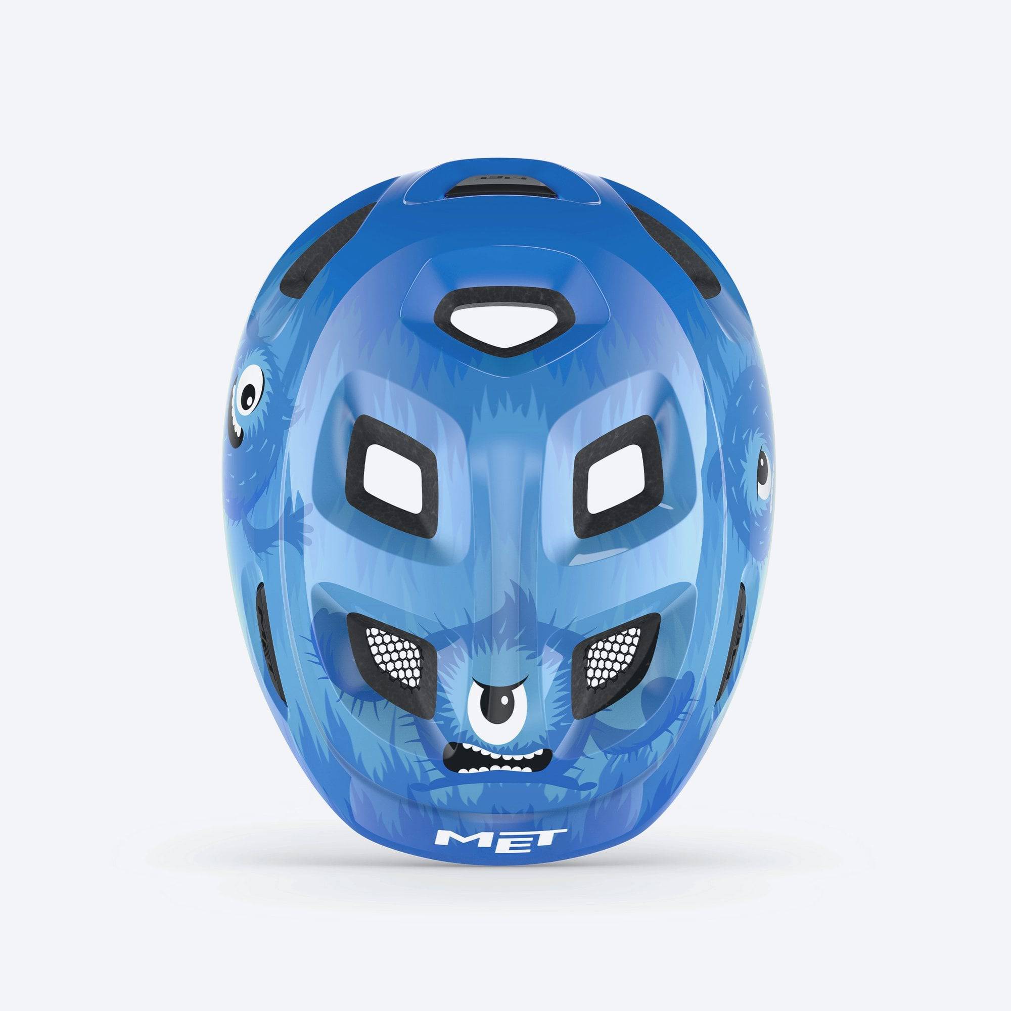 Child wearing MET Hooray toddler helmet with adjustable fit, ventilation, and safety features for outdoor activities.
