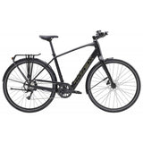 Trek FX+ 2 LT e-hybrid commuter bike with pedal-assist, front rack, and disc brakes, perfect for urban riding.
