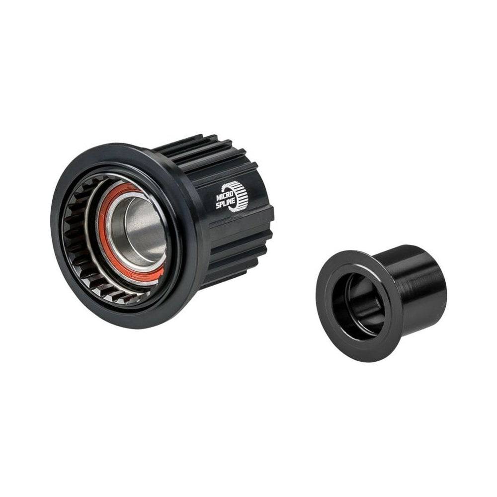 Black DT Swiss Bontrager DT240 MTB hub part with Shimano Micro Spline freehub endcap, used for mountain bike wheel maintenance.