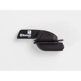 Black Bontrager DuoTrap S wireless speed and cadence sensor, compact cycling accessory for bike performance monitoring.